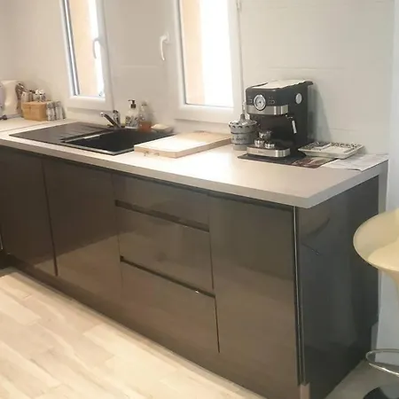 Petit Coin Ensoleille בוסוליי